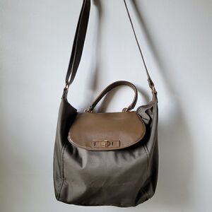 EUC OLIVE AND BROWN SLING BAG TWIST LOCK CLOSURE